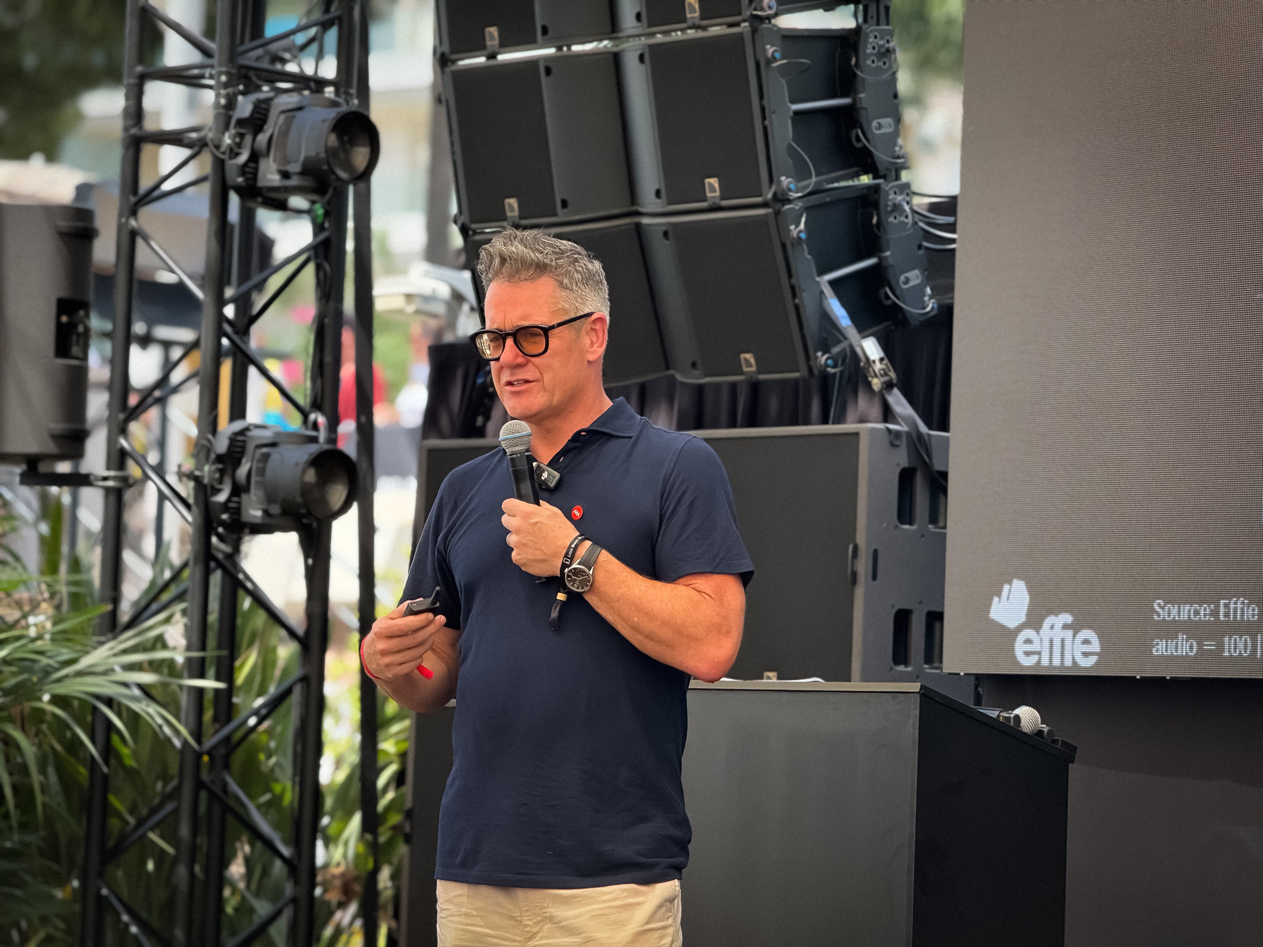 Mark Ritson speaking on stage at LBB & Friends Beach, Cannes Lions 2026, presenting global audio advertising effectiveness research sourced from Effie and System1 on behalf of Commercial Radio & Audio Australia and international radio industry partners.